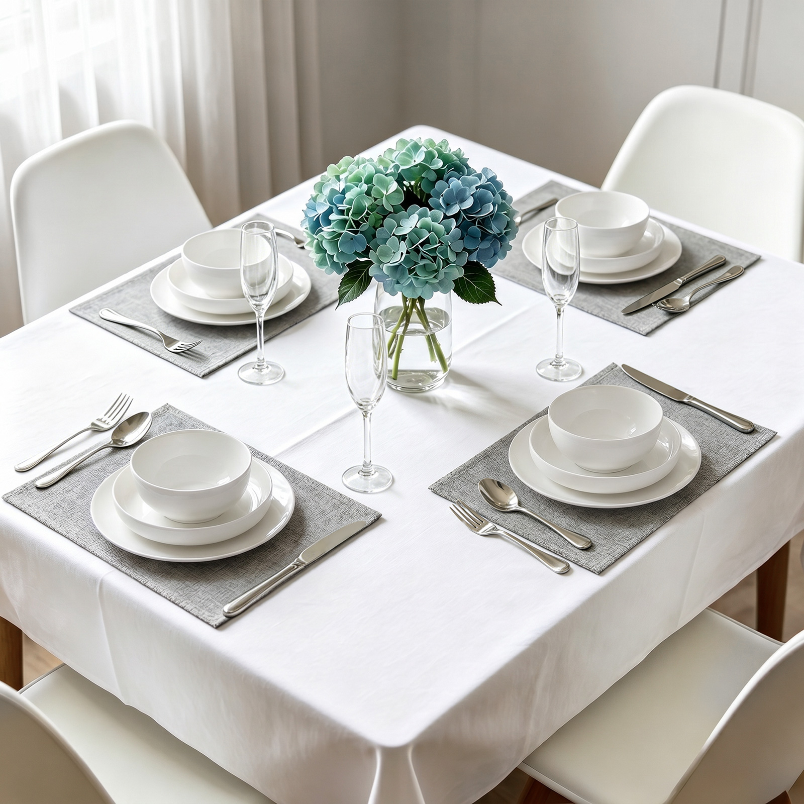 MOONLIT 12-piece white dinnerware arranged on an elegant dining table